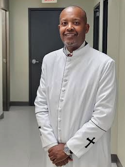 Wedding Officiant in formal clergy attire